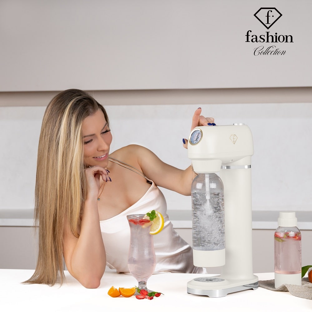 Soda maker with 2 bottles (Cream gold). The soda maker and its bottle being used.