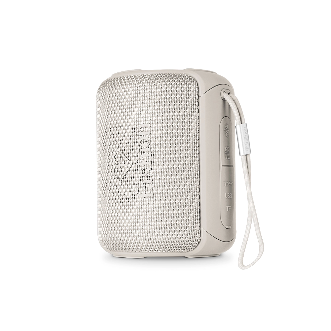 Kompakt Bluetooth-hangszóró, krém és arany. Termékfotó világos háttéren.